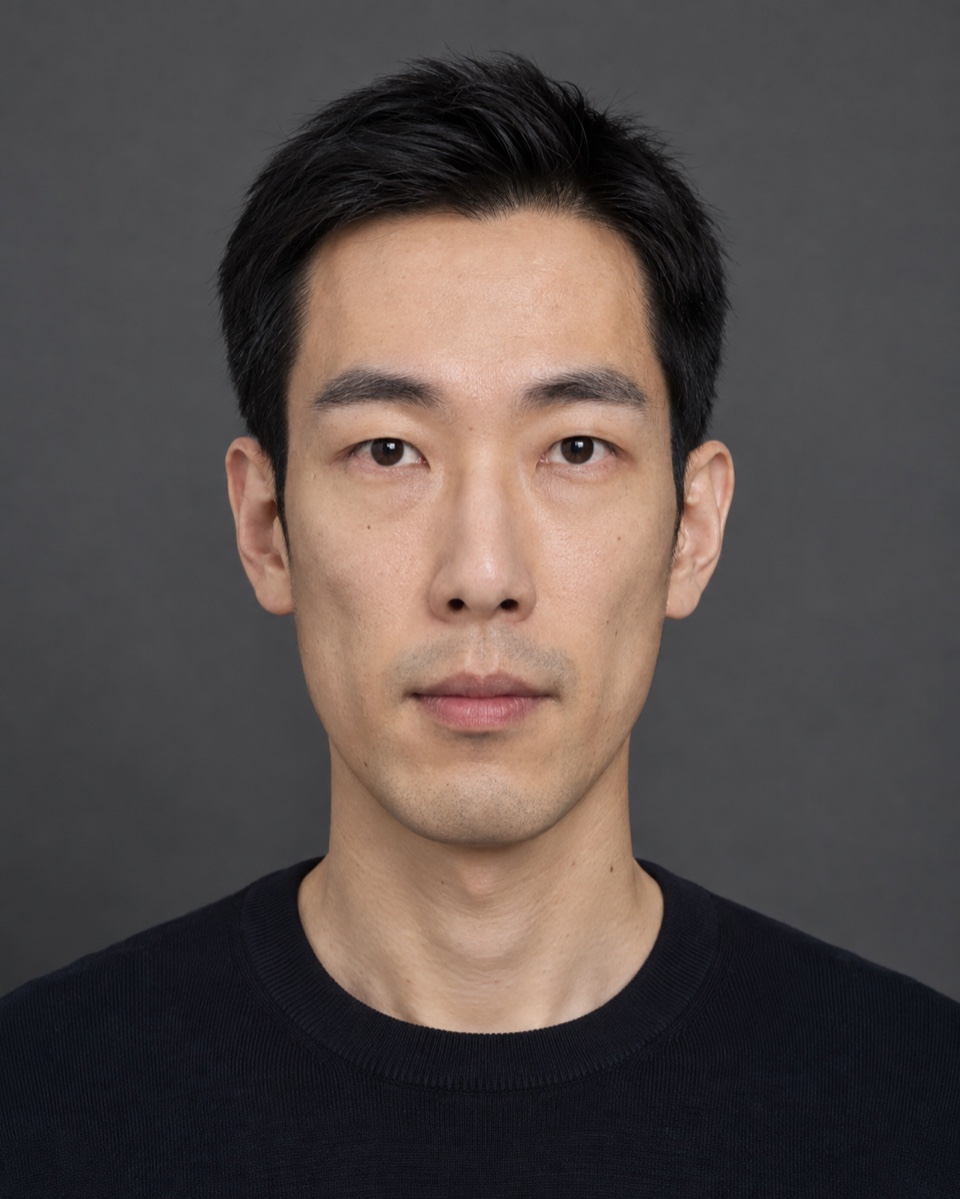 Front-facing portrait of a person with a long face and no glasses
