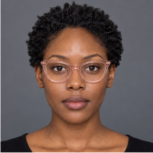 The same oval face wearing blush cat-eye glasses