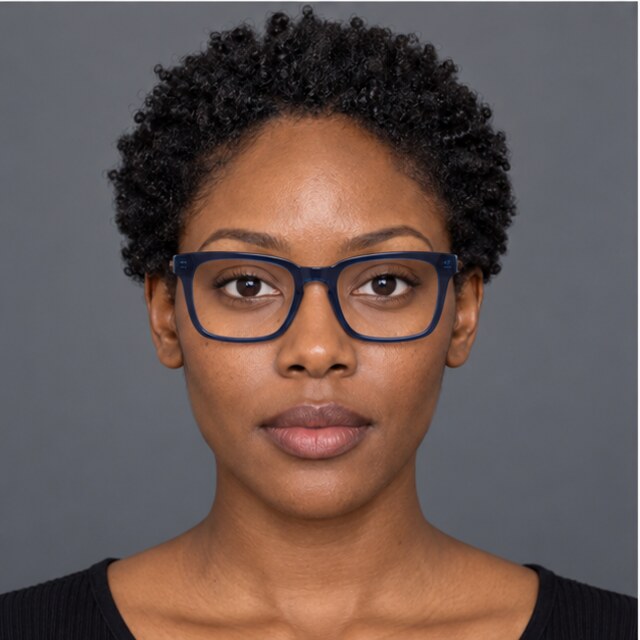 The same oval face wearing square navy glasses