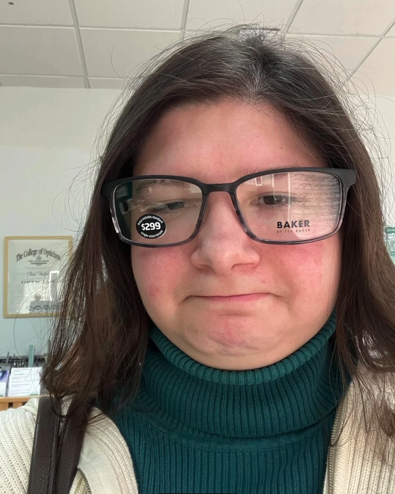 Reddit poster in wide black frames that run past the sides of the face