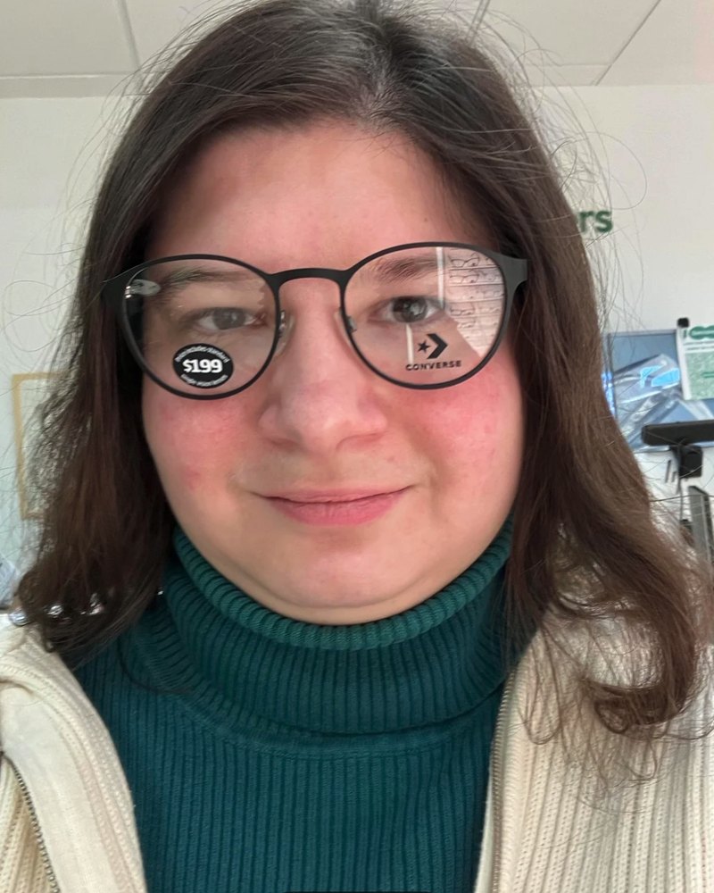 Reddit poster in black frames that sit high on the nose