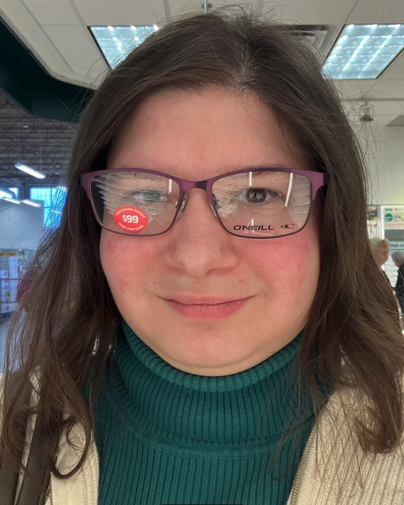 Reddit poster in a purple light cat-eye frame